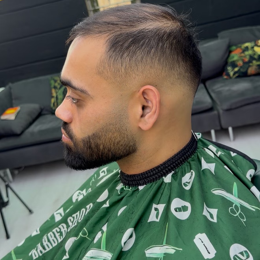 Fade haircut by Miguel at Straight Edge Barbershop