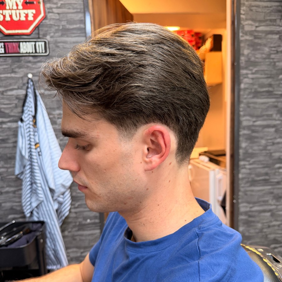 Textured taper haircut by Miguel at Straight Edge Barbershop