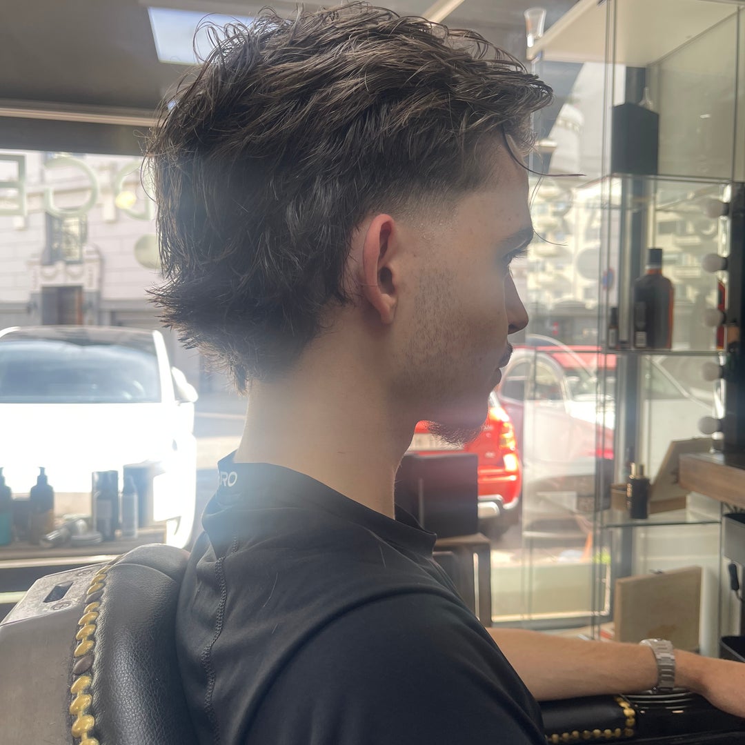 Styled cut by Tony at Straight Edge Barbershop